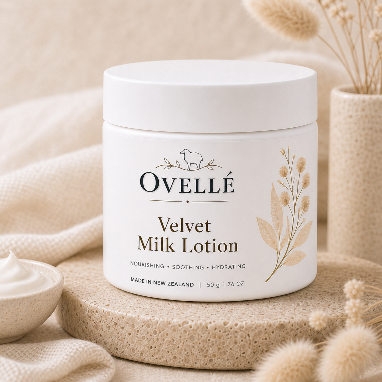 Creamy Ovellé Velvet Milk Lotion bottle with a soft, luxurious design, highlighting its smooth, moisturizing skin care formula.